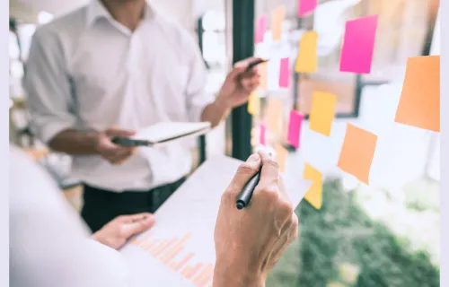 brainstorming notes on a glass wall