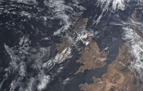 Weather events including clouds covering earth as seen from space