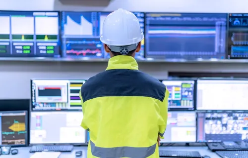 engineer monitoring data on screens