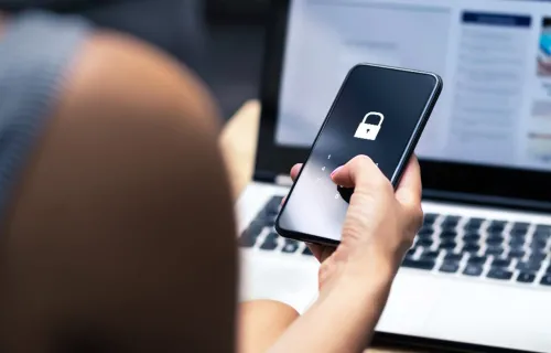 Woman with security lock on phone